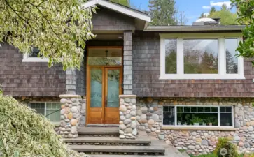 Grand Entrance to the Upper Level of the Home thru the Double Door with Etched Glass & Transom~River Rock Accents the Home & Stairway~One of a Kind Custom Features~