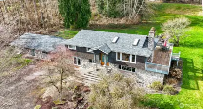 Two Homes in One~Multi*Generational Lifestyle OR Rental Income?~Room for a Crowd without Being Crowded~Entertainment Sized Deck on the North end of the Home & a New Roof on the Home & Garage~