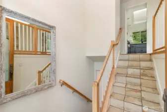 Grand Entrance Door~ Stairs Down go to the Main Level of the Home & Stepping up Leads to the Upper Level of the Mid*Entry Home~