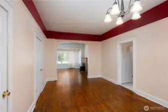 Another view of downstairs dining area and living room. Kitchen is off to the left.