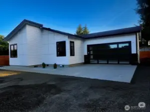 Garage door is AI generated. Similar one will be installed soon.