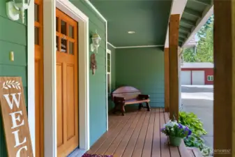 Entry way has large covered porch great for more sitting and seasonal decorating.
