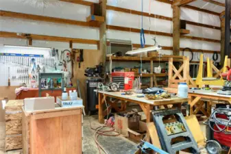 Inside the spacious 1,440 sq ft shop, there’s ample room for woodworking, metalwork, auto projects, or any hands-on hobby. Outfitted with 220V power, the space is ready for heavy-duty tools, welders, or equipment—making it a fully functional workshop, maker space, or storage solution.