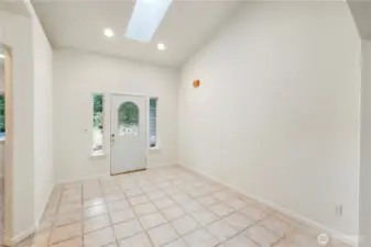 Large Entry Way, Skylight & vaulted ceiling