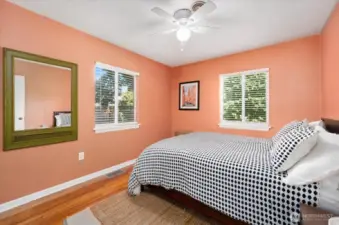 Bedroom with view of backyard and 2 closets