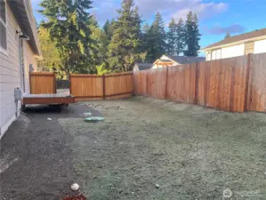 Fenced yard for the kids or furry friends