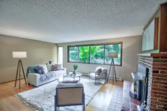 The living room faces the garden for green views and sunshine.