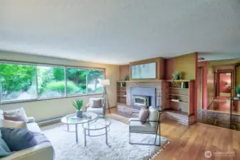 Classic built-in shelving of the era surrounds the fireplace.