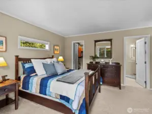 Primary Bedroom features a large walk-in closet and 3/4 bathroom