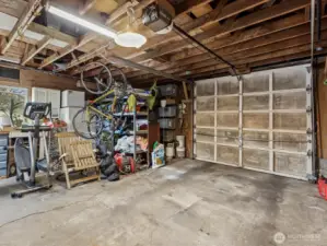 Large, detached single car garage with plenty of storage space and room for your tools and workbench.