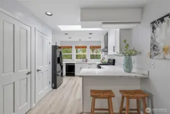 Renovated kitchen complete with skylight.