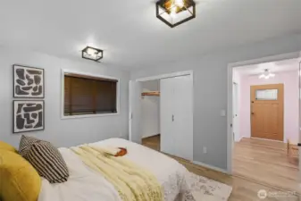 Versatile lower level bedroom features updated finishes and thoughtful lighting.