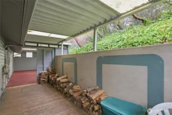 Back deck includes covered storage area.