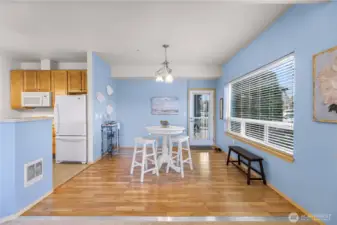 Plenty of room for a larger dining table, sideboard, or bar.