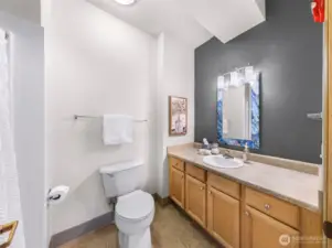 It's easy for 2 people to get ready in the morning with this en suite bathroom.  Generous walk-in shower!
