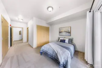 This bedroom comes with separate his and hers closets and connects directly to the main bathroom.