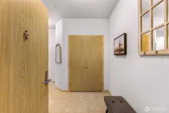 Mud/utility room off the interior condo entrance.