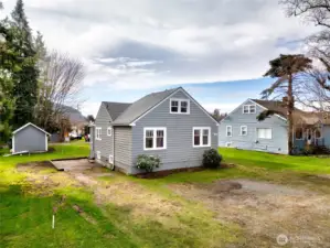Property lines are marked. (Small garage is not part of this property- see stakes)