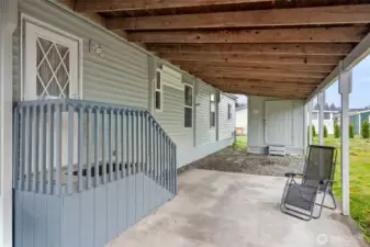 Carport with storage shed