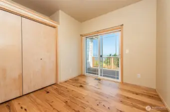 Office/third bedroom with deck access.
