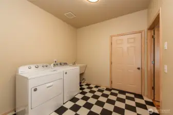 Large laundry/mud room off of garage.