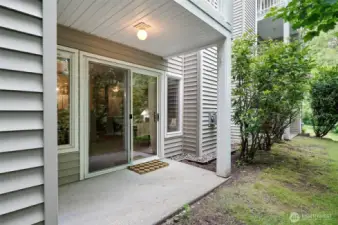 private patio facing a lush green belt corner unit!