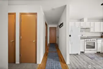 Entry Way from front door and Garage with Storage Closets