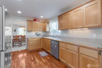 The kitchen comes complete with tons of storage and counter space.  You will love the stainless steel appliance package and the beautiful solid wood cabinets that look brand new.  The undermount lighting is also a wonderful touch.