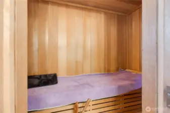 Check out this fabulous professionally installed cedar sauna. Located in the primary bathroom for optimal privacy, you will absolutely love this unique feature!