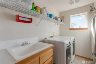In so many homes the laundry room is an afterthought.  Surely not the case here!  You will love all the space to operate and the handy utility sink.  The high-end washer and dryer are included in the sale of this home.  Even the laundry room has wonderful natrual light!