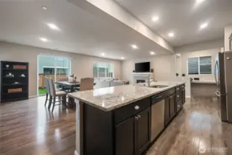 The heart of this home--were life takes place! Spacious kitchen and great room (with office nook seen ahead), this is the space that you'll fall in love with every single day.