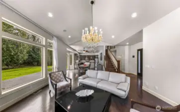 Spacious living area with abundant natural light and outdoor views