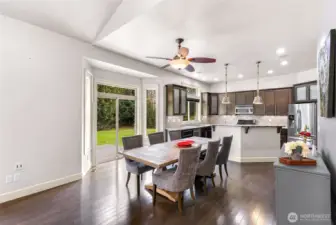 Dining area with open concept layout connecting to kitchen
