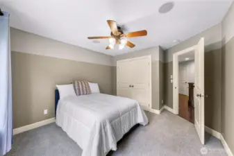 Second bedroom upstairs has carpet and looks out the back