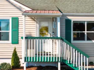 Enjoy small town charm from the quaint front porch of this home.