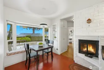 Informal nook and fireplace extend the kitchen.