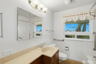 Main floor full bathroom.  This serves the second bedroom and guests.