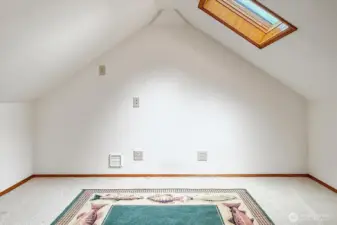 Extra finished room above the garage accessed from the bonus room