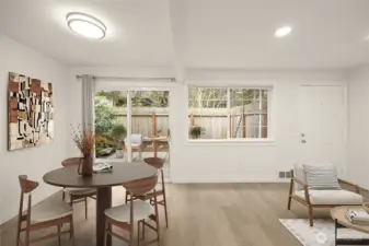 Living area and dining space (virtually staged)