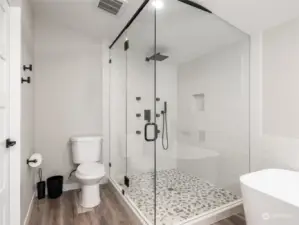 Primary bathroom with oversized shower.