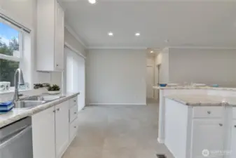 View from Laundry room through kitchen into dining room.