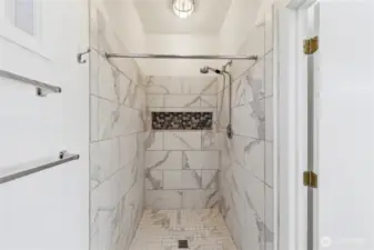 Marble and tile shower.