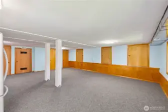 Lower level has 900 sq ft of dry storage through the smaller doors.
