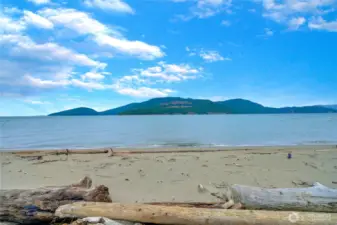 There is one beach access co-owned by Potlach neighbors with stairs, and another public access point here just down the road.  Not marked on road, either one, but you'll get the info!