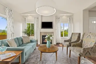 Ample windows and tall ceilings allow natural light to enhance the space.
