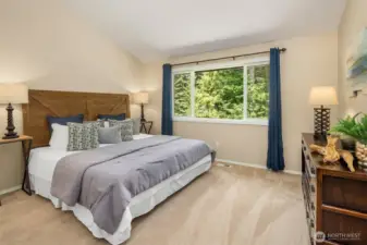 Primary en-suite with views of backyard.