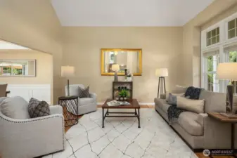 Upon entering, the living room to the left greets you.