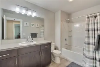 Main bath on upper floor.