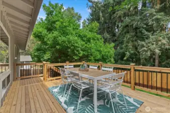 Brand new, spacious cedar deck with space for outdoor seating, grill, and more.
