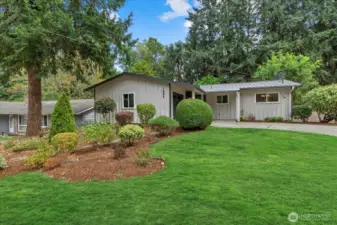 Front of the home on a private Lake Hills parcel.